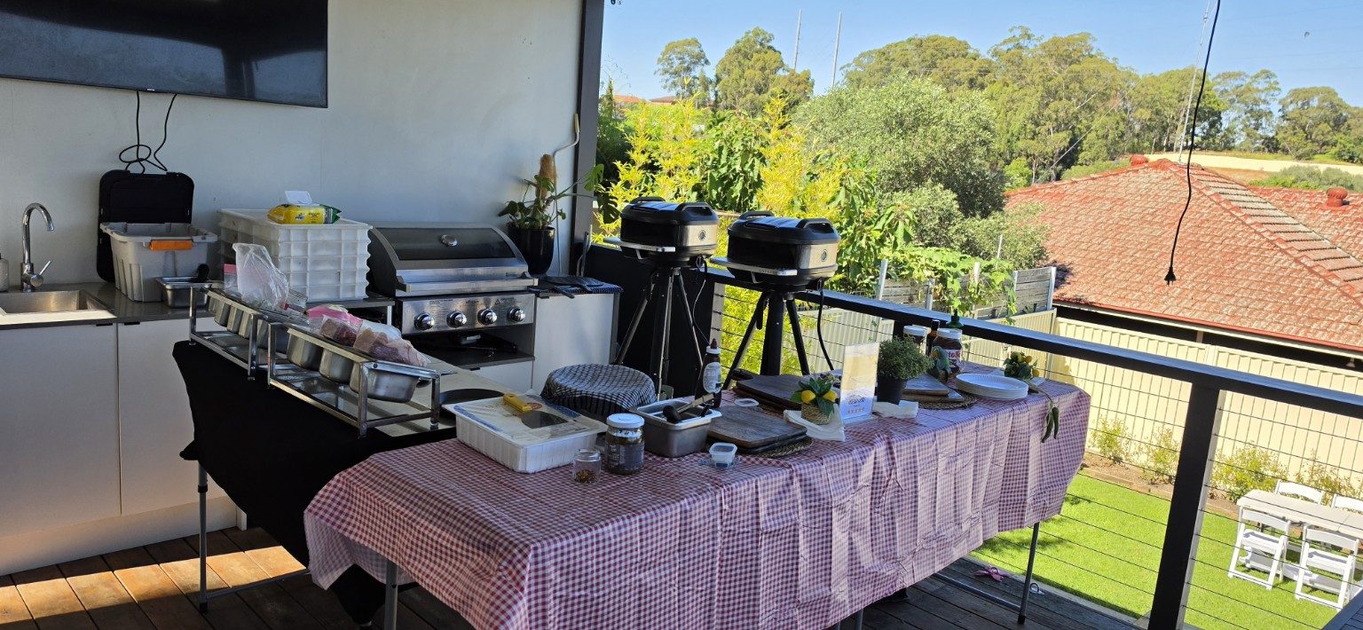 Azzurri pizza catering setup on a Sydney rooftop terrace with twin mobile pizza ovens and BBQ station Azzurri pizza catering setup on a Sydney rooftop terrace with twin mobile pizza ovens and BBQ station