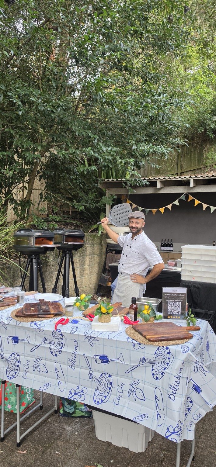 Stefano, head pizzaiolo at Azzurri, cooking authentic Neapolitan pizza live at a Sydney backyard event Stefano, head pizzaiolo at Azzurri, cooking authentic Neapolitan pizza live at a Sydney backyard event